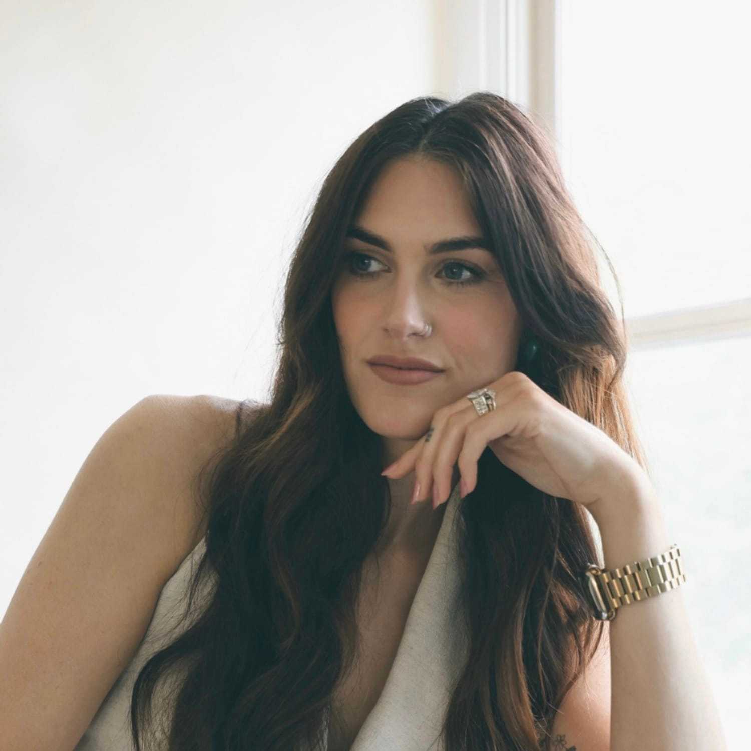 Portrait of Mallory, a professional stylist at Stella Beauty, showcasing their expertise and style.